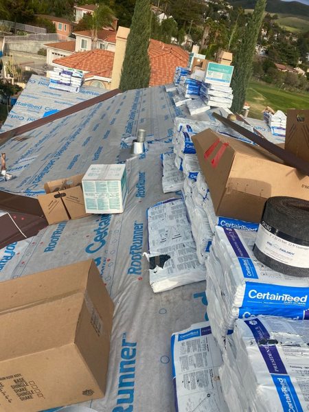 Tile roof replacement with shingles for solar panels — PRO Builder project